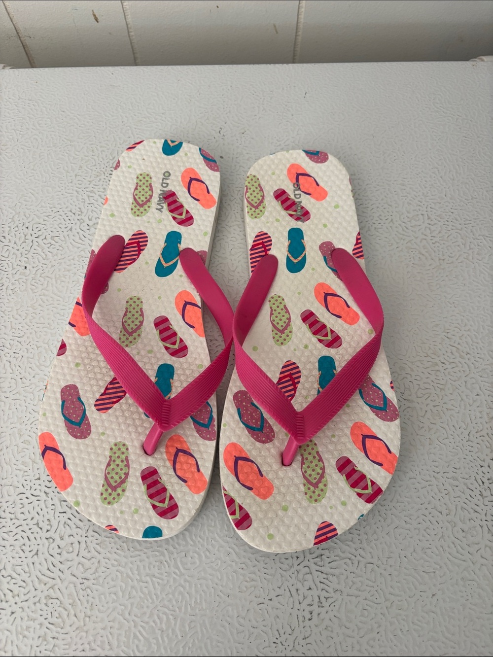 Old Navy Pink Strap Flip Flops with Multicolor Print